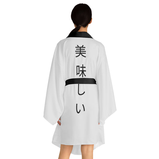 White Kimono Robe with Black Trim with a Japanese word that says "Delicious"